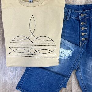 STITCHING in black DTF style unisex tshirt on tan color